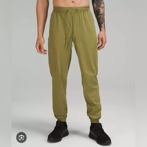 Never worn, Lululemon License to Train Cargo Jogger. Green. XL.